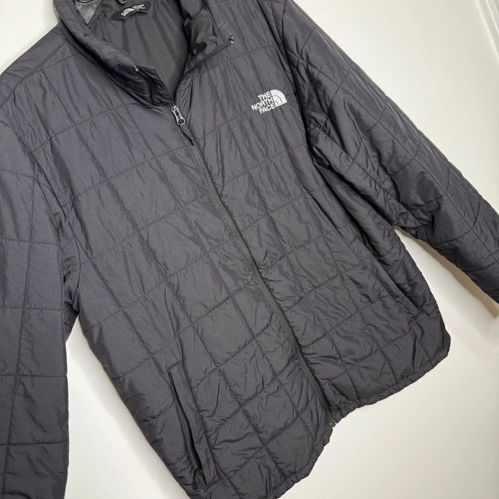 The North Face size pit